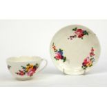 Nantgarw porcelain cup and saucer hand painted with flowers, the saucer 14cm diameter The saucer has