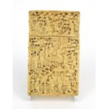 Oriental Chinese ivory card case carved with scenes of elders, pagodas and trees, 9.5cm high