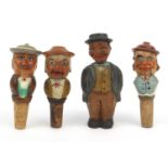 Three novelty hand painted wooden bottle stops with googly eyes, opening mouths and pointing