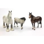 Three Beswick horses including a brown example, the largest 22cm high All three horses are in