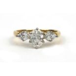 18ct gold diamond three stone ring, size K Oval centre stone 7x5mm approx. 0.90-1.00ct - marquise