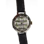 Military interest World War I silver gentleman's wristwatch with trench guard, 3cm diameter