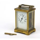 French brass cased carriage clock with enamel dial and swing handle, 12cm high