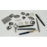 Group of objects including fountain pens including two marbleised examples, silver wristwatch,