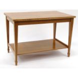 Oak two tier occasional table with figured top and label for R.J. Chopping Cabinet Maker Eastbourne,