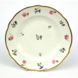 Nantgarw porcelain plate sparsely hand painted with flowers, 22cm diameter Generally good condition,