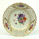 Continental Meissen pierced porcelain plate hand painted with flowers and insects, blue crossed