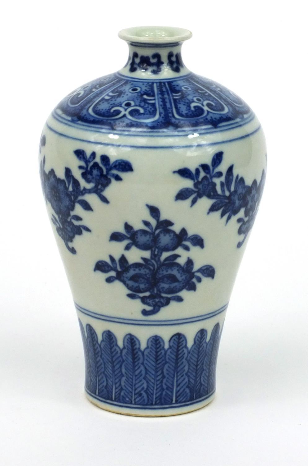 Oriental Chinese porcelain vase hand painted with flowers, character mark to base, 13.5cm high