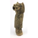 Islamic hardstone carving of an animal, the reverse carved with a face, 47cm high