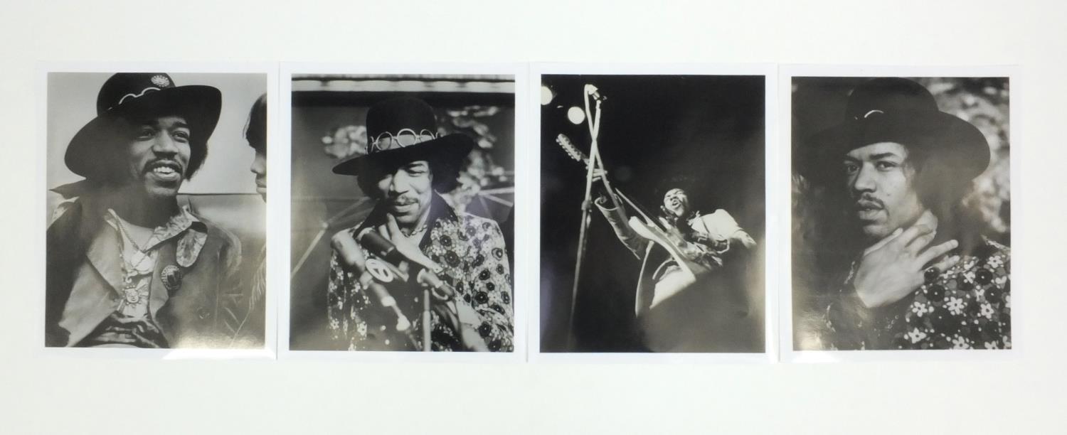 Four Jimi Hendrix black and white publicity photographs, each 25cm x 21cm