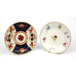 Two Swansea porcelain plates - one hand painted with flowers, each 20cm diameter Both plates are