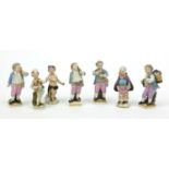 Seven Continental hand painted Meissen and Berlin porcelain figures of children and cherubs, the