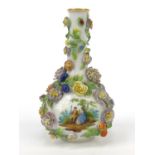 Continental floral encrusted porcelain vase hand painted with scenes of lovers, crossed swords