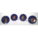 Set of four Wedgwood porcelain plates hand painted with fruit by A. Holland, each 19cm diameter