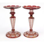 Pair of Victorian ruby overlaid glass lustres with hand painted floral decoration, 22cm high