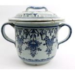 English Delft Pottery posset pot and cover hand painted with floral decoration, 28cm high