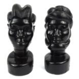 Large pair of African carved ebony busts of tribal figures, the larger 43cm high