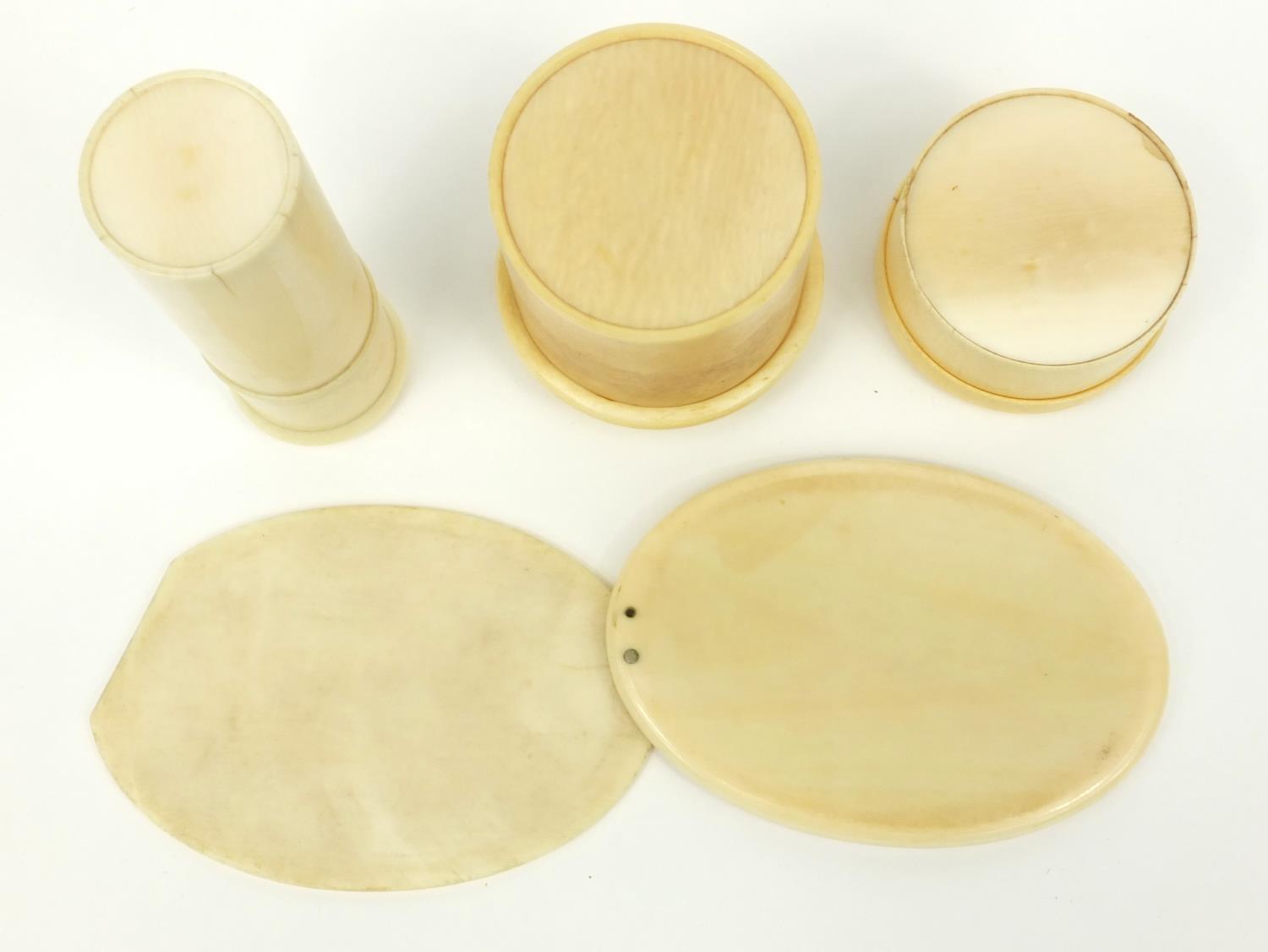 Three ivory screw top containers, together with an ivory hand mirror, the hand mirror 11cm long when - Image 5 of 5