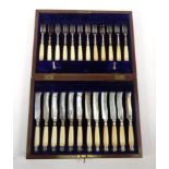 Set of twelve silver plated and ivory forks with silver mounts housed in a fitted walnut box