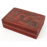 Oriental Chinese cinnabar lacquer box and cover carved with figures, 19cm long