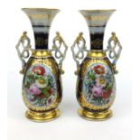 Pair of Continental porcelain Sevres style vases hand painted with panels of flowers, each 39cm high