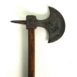 Antique cast iron axe head on a wooden pole, 17cm diameter