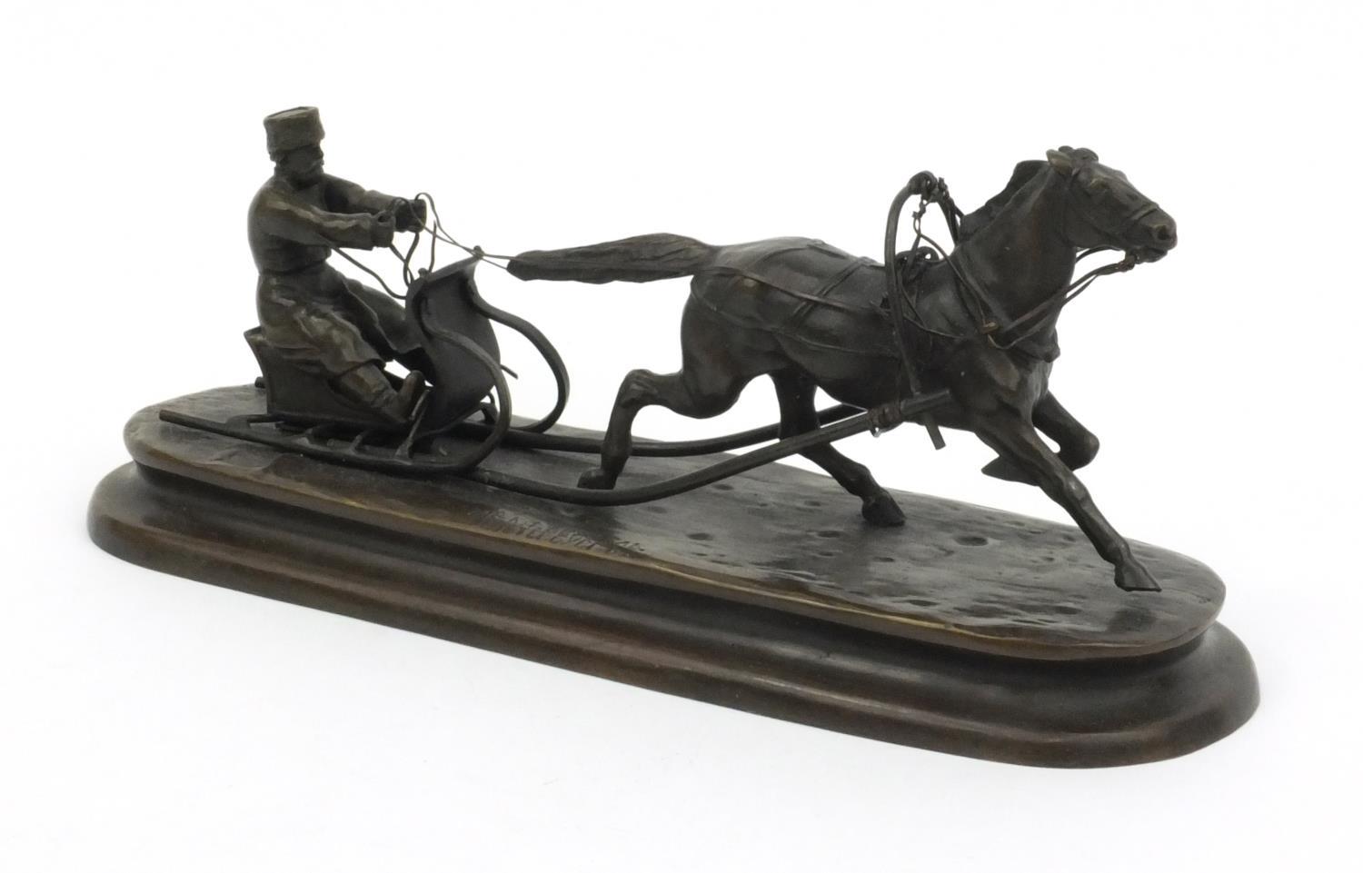 Russian bronze model of a horse and sleigh signed C. Metepbypprb?, 23cm high