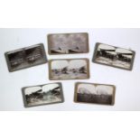 Five military interest stereoscopic view cards of World War I bi-planes and airships