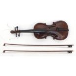 Old wooden violin with carved scroll neck, together with two bows, the back 36cm long