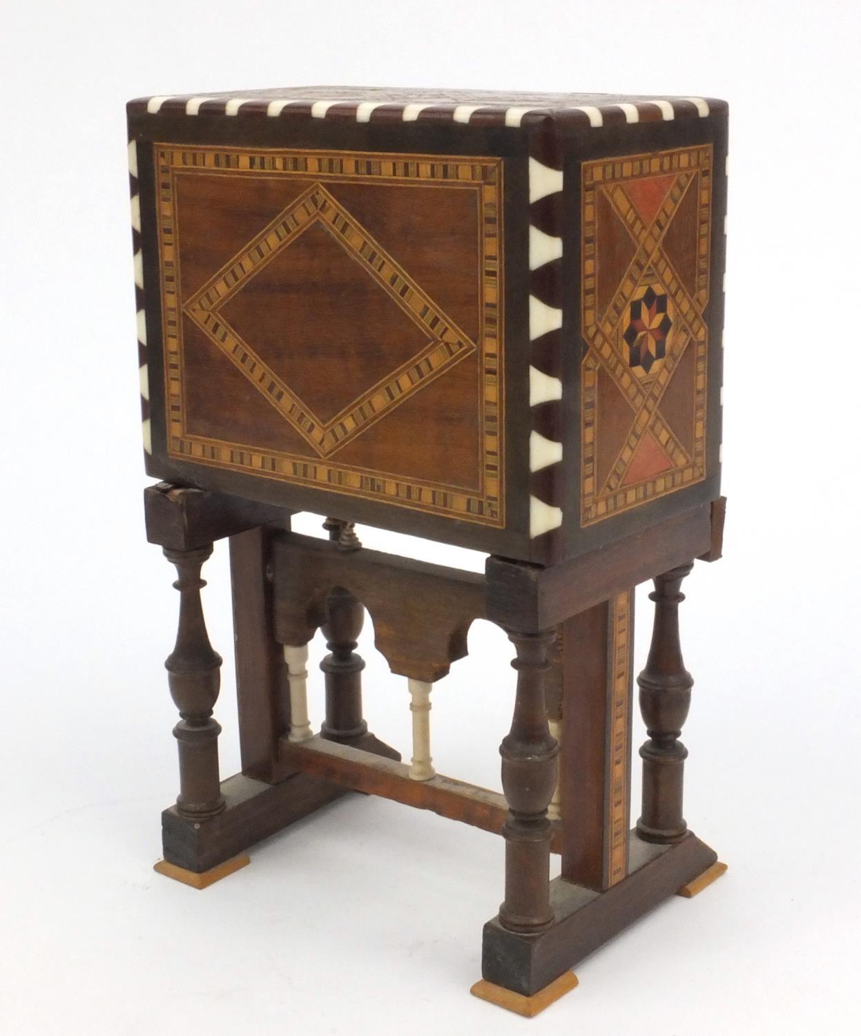 Miniature wooden inlaid cabinet with ivory supports and fitted ivory interior, 22cm high - Image 4 of 5