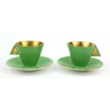Two Art Deco Shelley green coffee cups and saucers with gilt interiors, each cup 6cm high All are in