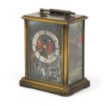 Brass cased Acctim carriage clock with swing handle decorated with hunting scenes, numbered 669849