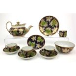 Part Newhall vine design tea service including teapot, cover and stand, slop bowl, bread and