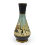 Middle Eastern pottery vase hand painted with a view of a street and mosque, 26cm high