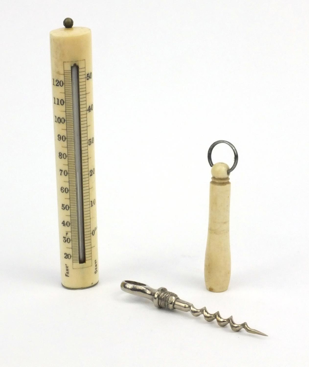 Pillischer London ivory thermometer and an ivory steel corkscrew, the thermometer 13cm long