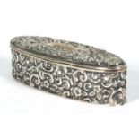 Oval silver jewel box with hinged lid and embossed floral decoration, Birmingham 1897, 11cm long