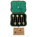 Cased set of six silver gilt Coronation spoons, London 1901-02, each 11cm long, housed in a fitted