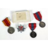 Boxed Imperial Service medal for Eastman West, Fireman's Exemplary medal for Cyril West, together