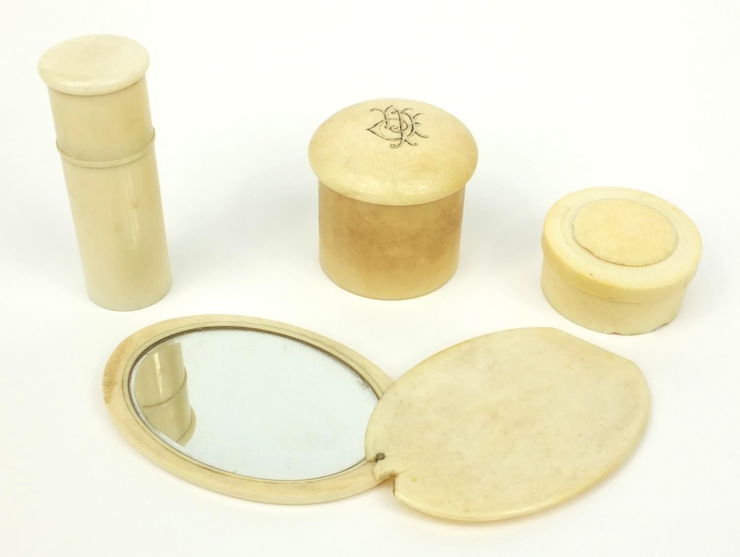 Three ivory screw top containers, together with an ivory hand mirror, the hand mirror 11cm long when - Image 4 of 5