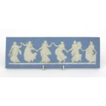 Wedgwood blue and white Jasperware pottery plaque 'Dancing Hours', impressed mark to back, 16cm