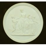 Framed Royal Copenhagen Parian plaque of a robed lady with putti and a child, the plaque 14cm