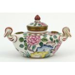 Continental twin handled inkwell hand painted with flowers, mark to the base, 9cm high