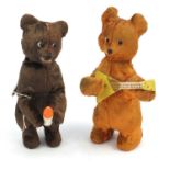 Two vintage Russian clockwork bears - one playing a musical instrument, the largest 25cm high