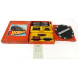 Boxed Hornby clockwork 0 gauge tinplate train set, the locomotive numbered 60199, together with a