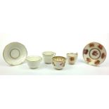 Swansea porcelain trio, together with a porcelain cup painted with strawberries and a cup and saucer