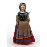 Continental bisque headed costume doll with silk and beaded clothes, 35cm high