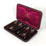 Cased set of six Victorian silver teaspoons and sugar tongs, WCJL London 1887, housed in a