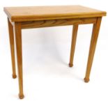 Oak Arts and Crafts style centre table with moulded edge, 73cm high x 79cm wide x 40cm deep