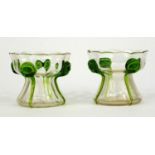 Pair of Art Nouveau clear and green trailing glass vases, each 9cm high Both have chips around the