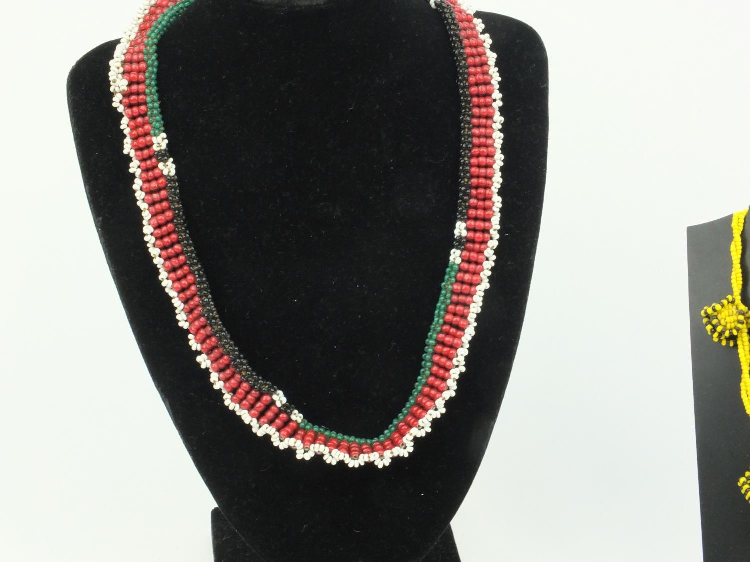 Four tribal beadwork necklaces, the largest 27cm long - Image 2 of 6